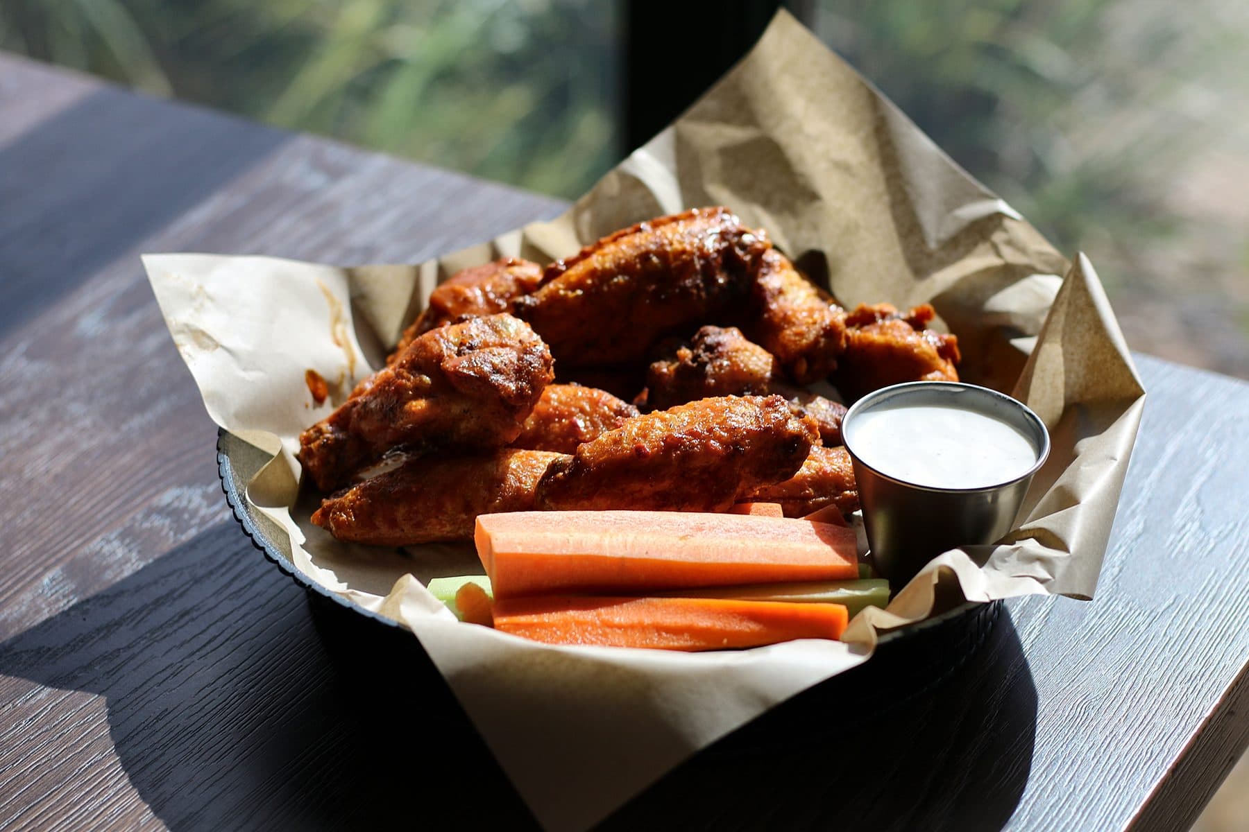 Smoked wings in Tank sauce with carrots, celery and ranch